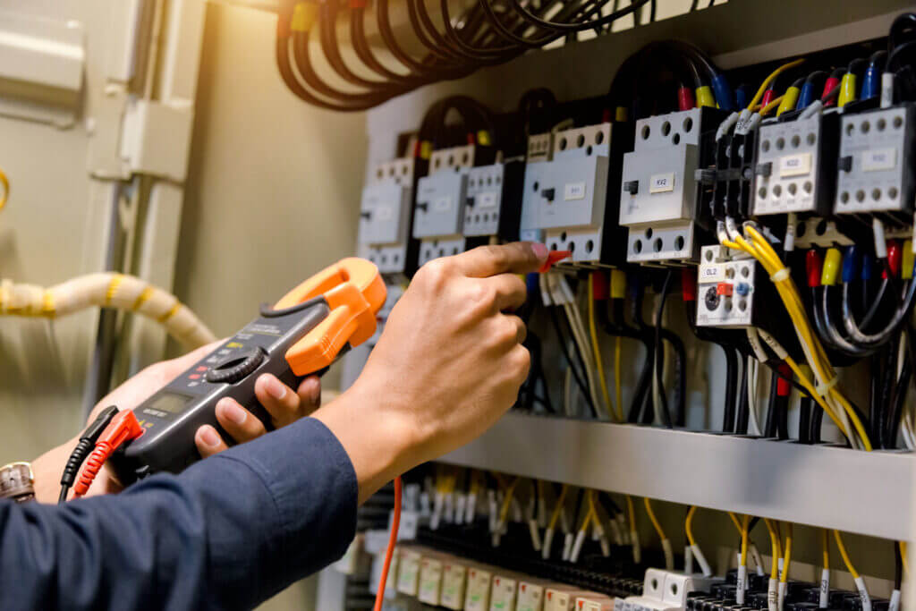 electrician repairing an electrical panel